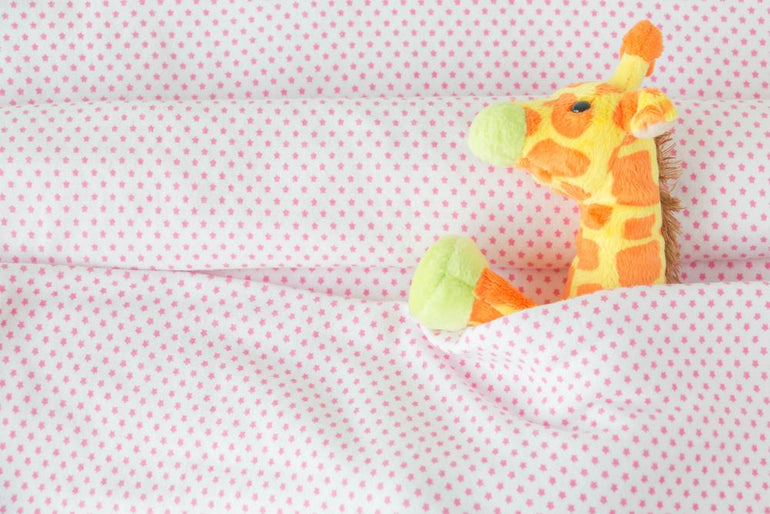 When Can Babies Sleep with Blankets and Pillows? Guava Family